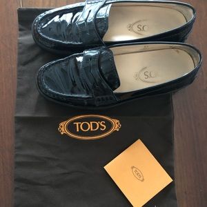 Black patent leather Tod’s loafers